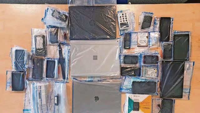 Computer expert who helped crooks steal £100m is caught at airport