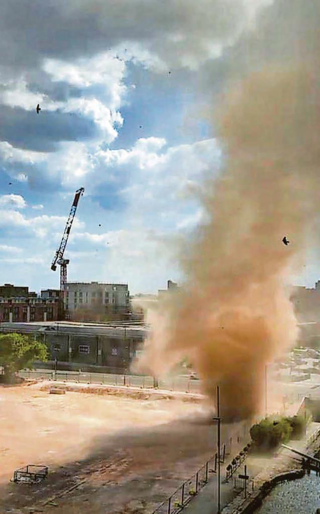 Ill wind as 'dust devil' sweeps through city