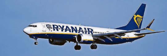 Plane cabin crew 'restrain' woman who tried to open door during flight