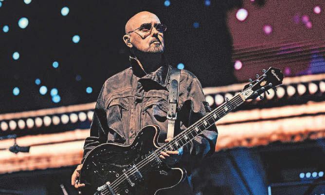 Bonehead takes Oasis tour break in cancer battle