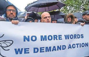 THE RAIN MASKED THE TEARS BUT NOTHING COULD HIDE THE ANGER