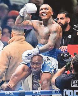 Benn eyes world title shot after victory over Eubank Jr