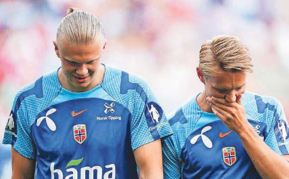 HAALAND HAS WORLD AT HIS FEET