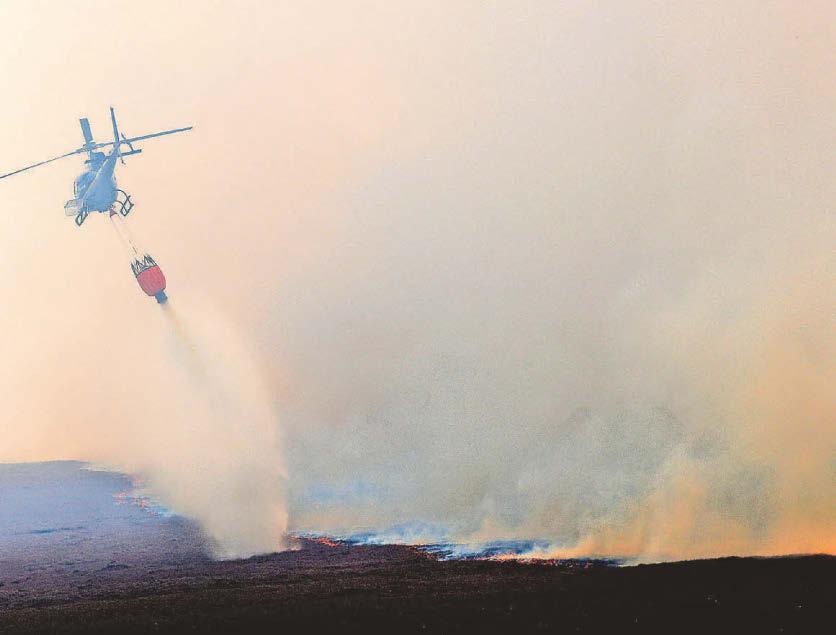 Emergency crews in fight to get moor fire under control