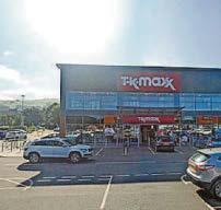Woman struck by car outside TK Maxx