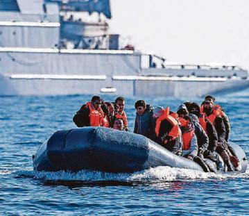 One dead and 62 pulled from sea as boat sinks