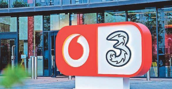 VODAFONE TO SPEND £1.3BN ON NETWORK AFTER MERGER