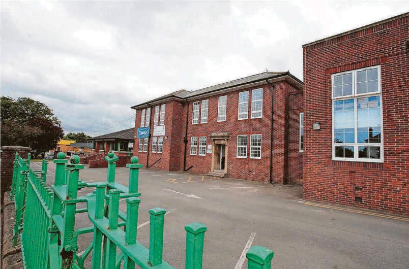 Bomb squad carry out controlled explosion after school evacuated