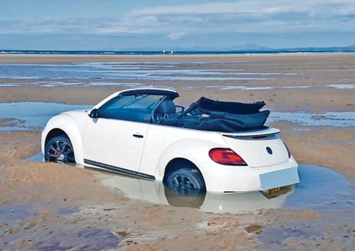 Not again ... another two vehicles swamped by sea