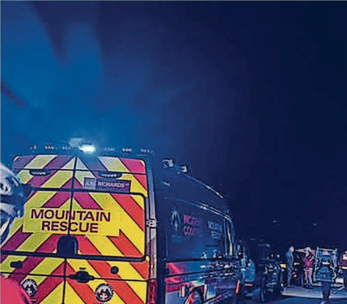 Woman rescued as car comes off pass