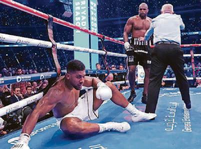 Trainer says AJ 'rushed' to fight