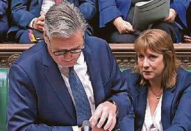 Chancellor appears upset as PM dodges backing her