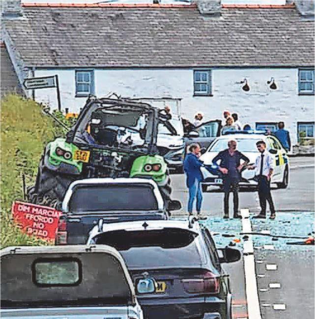 ROAD CLOSED AS TRACTOR INVOLVED IN COLLISION