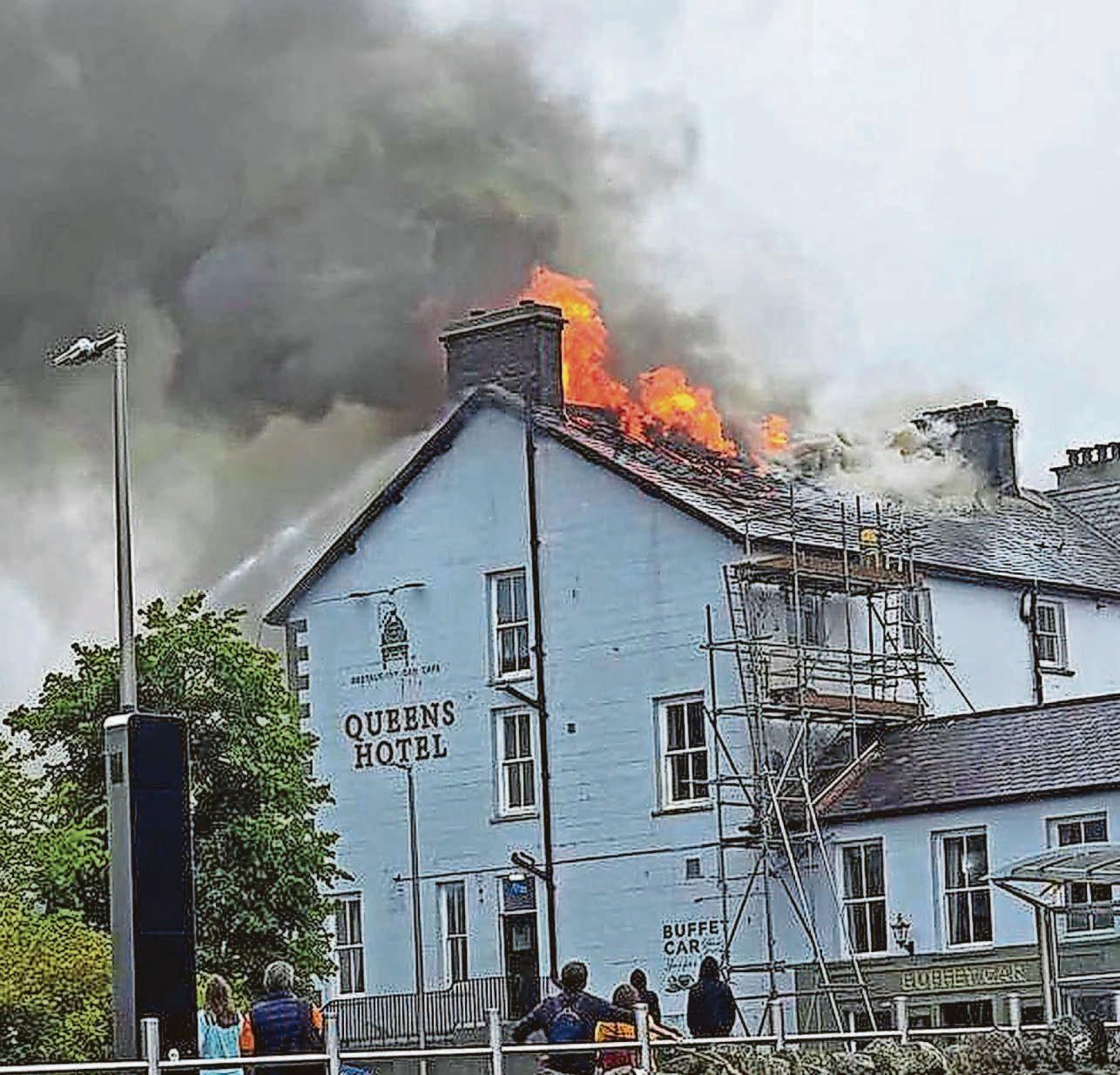 Fire-hit hotel 'looted' as raid branded 'vile'