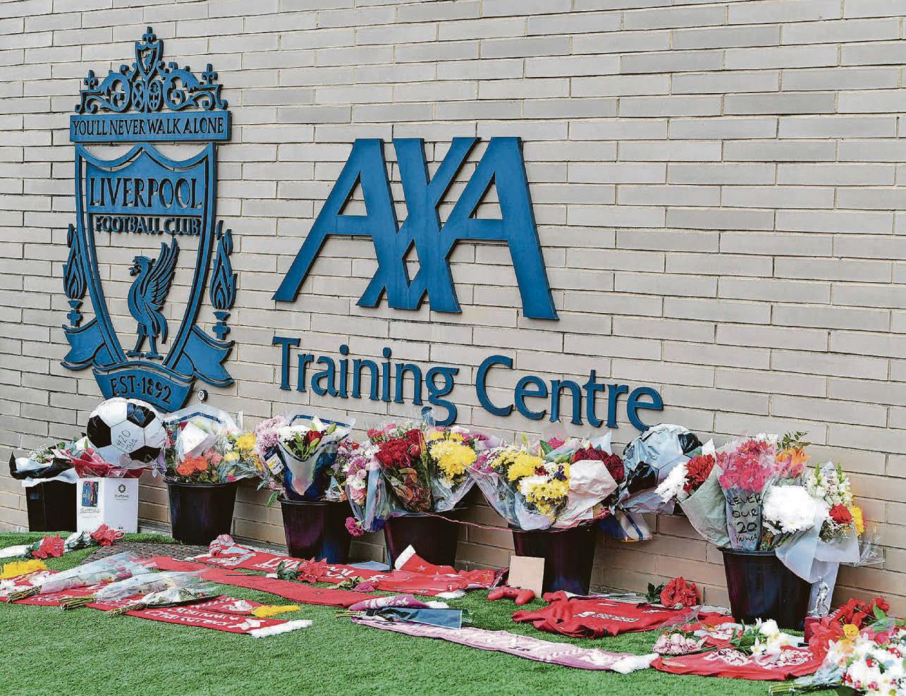 Reds return for pre-season amid sombre mood at AXA training ground