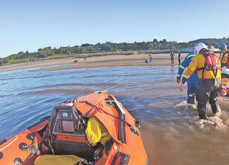 People 'up to their necks' at beach as tide surged in