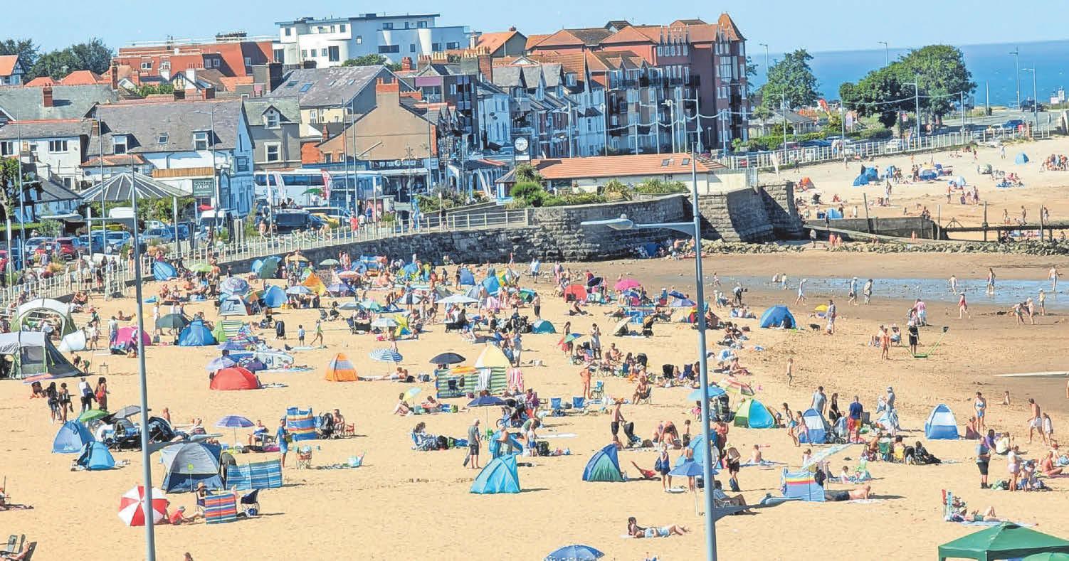 SCORES HEAD FOR COAST ON HOTTEST DAY OF YEAR