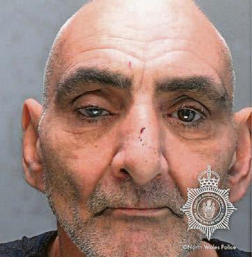 MAN ARMED HIMSELF AND STABBED DOOR AFTER THREAT TO KILL NEIGHBOUR