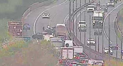 Four taken to hospital after A55 crash causes big delays