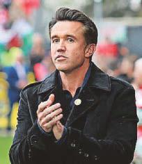 Dragons' Rob holds Prem title ambitions