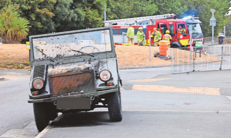VINTAGE JEEP CATCHES FIRE AT BUSY ROUNDABOUT