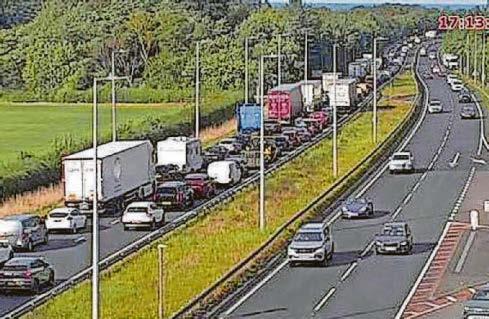 Gridlock on A55 as car overturns on headland
