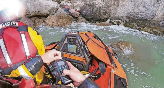 Injured climber is winched to safety