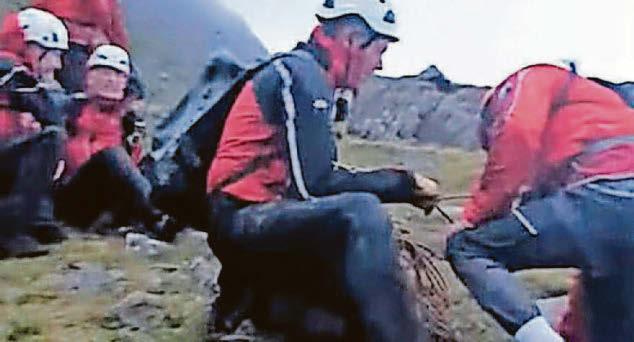 Walkers in trainers rescued in gale force winds on mountain