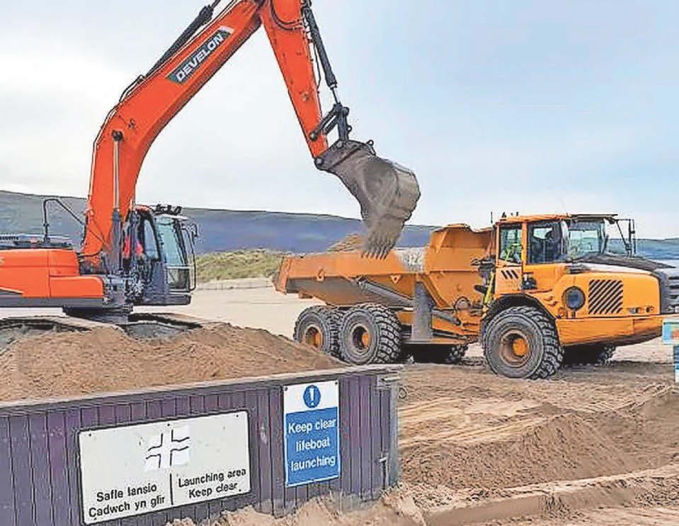 Huge sand-moving op starts at resort beach