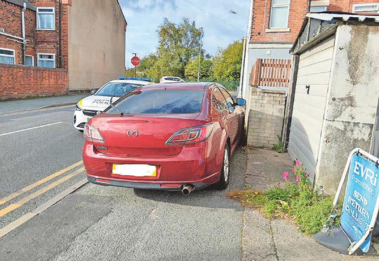 PAVEMENT-BLOCKING VEHICLES TOWED AWAY IN POLICE CLAMPDOWN
