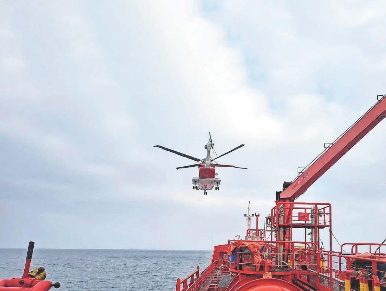 Emergency helicopter airlift saves crew member in dramatic sea rescue