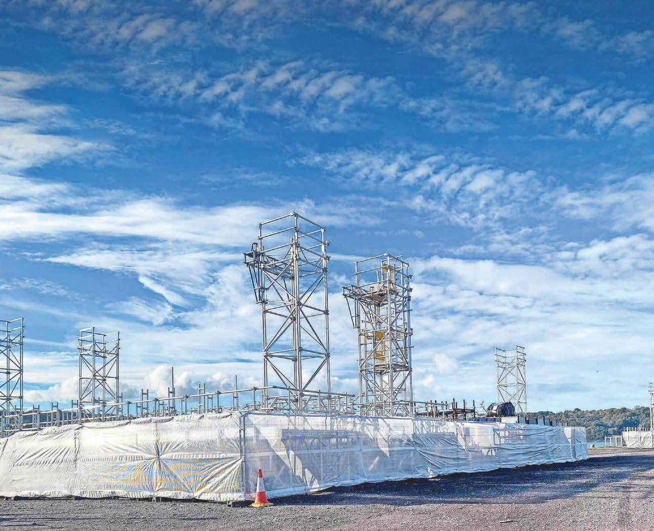 Massive array designed for suspension bridge lies unused on dock for months