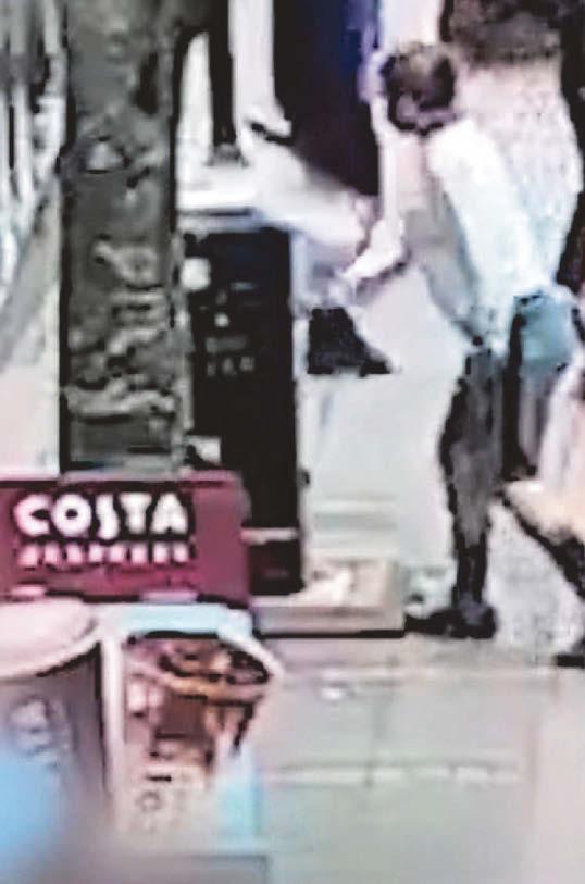 MOMENT WOMAN SMASHED BOTTLE BEFORE SHE THEN THRUST IT INTO MAN'S NECK