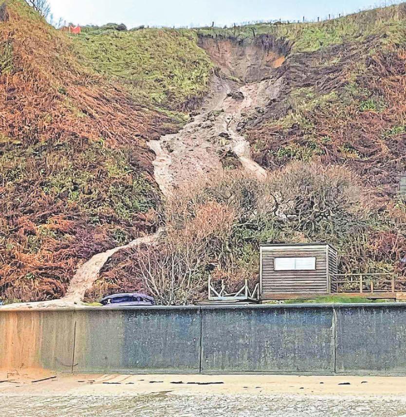 COASTAL LANDSLIDE CLOSES LONG-DISTANCE PATH AFTER DELUGE