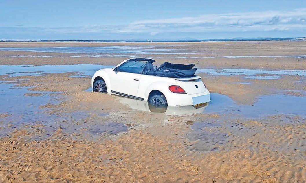 BEACH THAT SWALLOWS CARS
