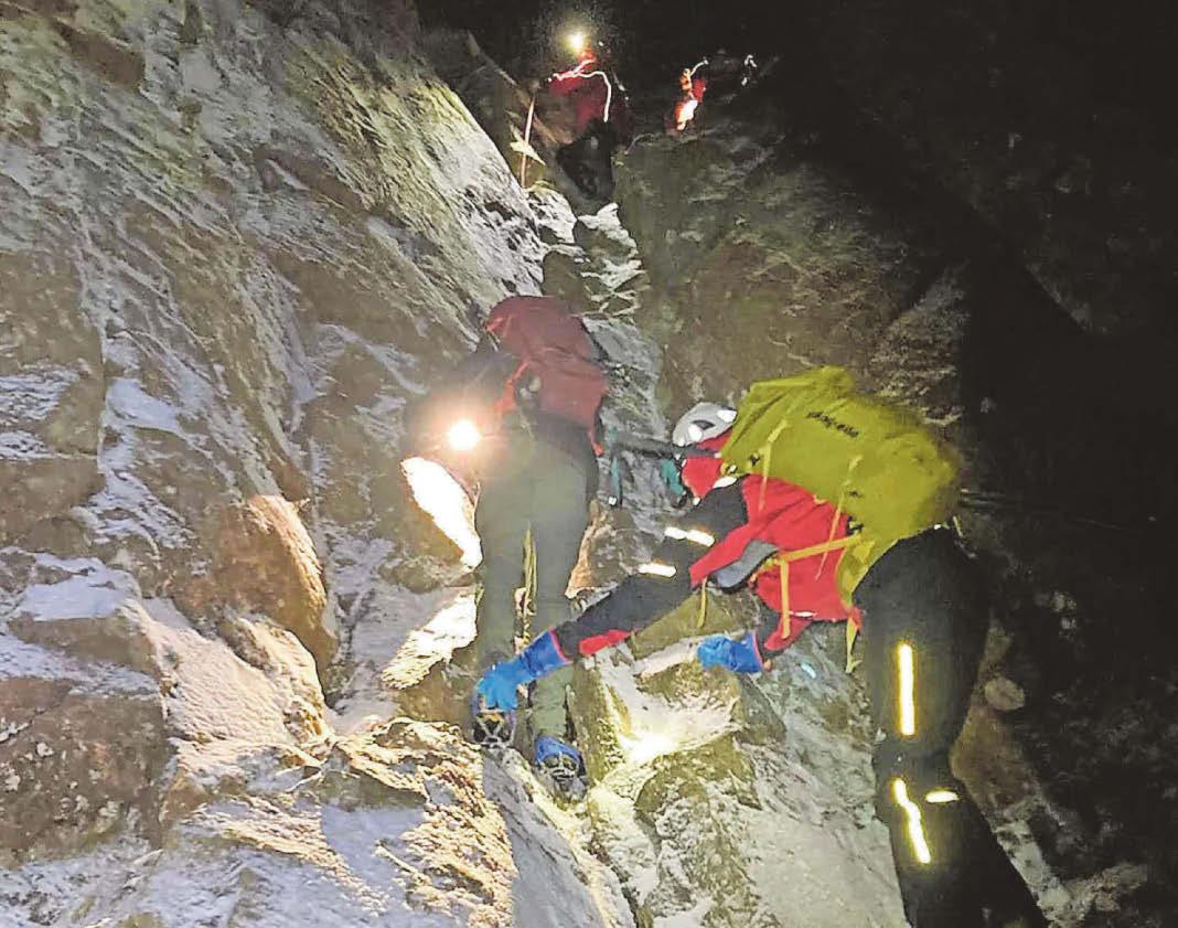 Family rescued after getting stuck on peak