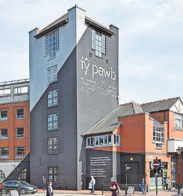 DEFICIT CUT AT CITY'S CULTURE CENTRE