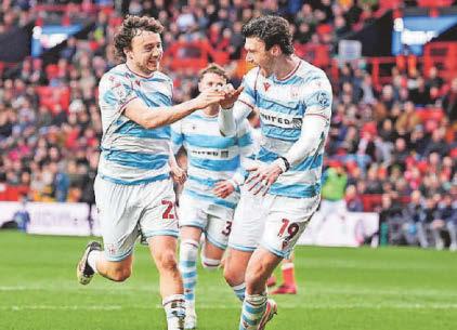 Wrexham stand firm after Rathbone goal puts them in charge
