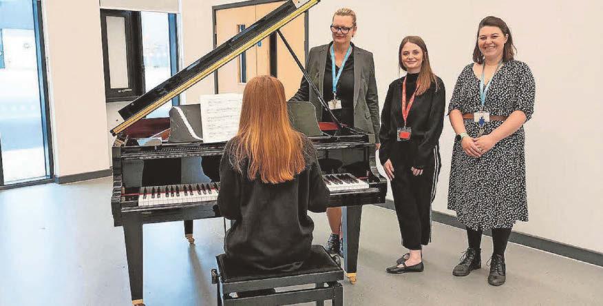 Builder hits right note with donation for baby grand piano