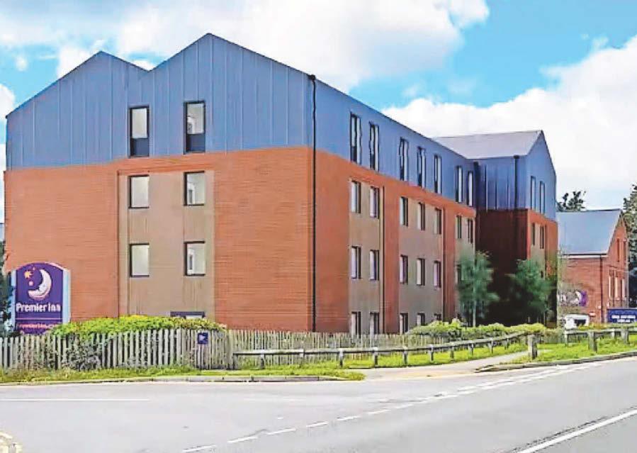 Hotel extension 'akin to a prison block' approved