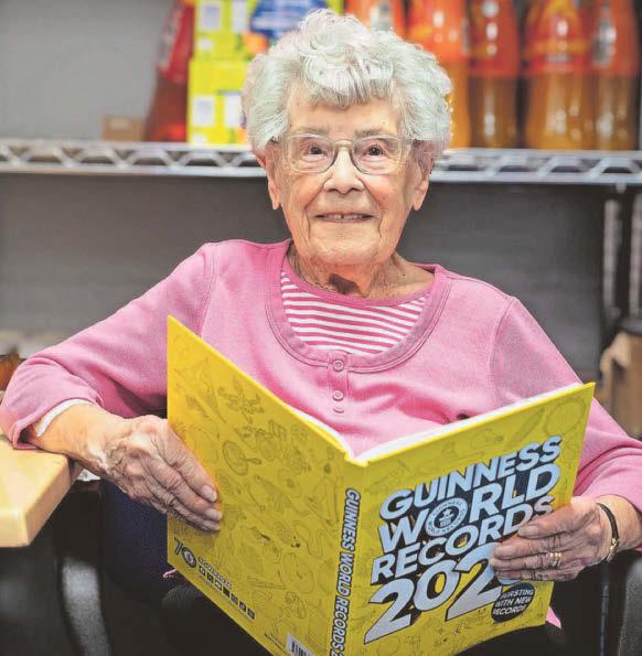 Beryl, 103, enters the record books after becoming world's oldest volunteer
