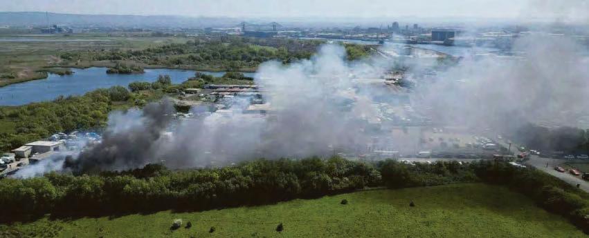 Scrapyard blaze visible for miles
