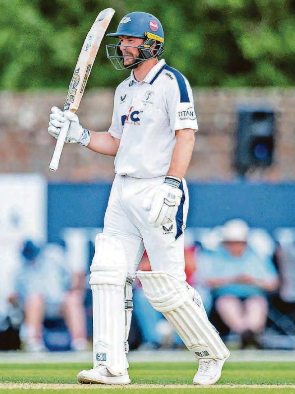 Bowlers fight back and keep Yorkshire in touch