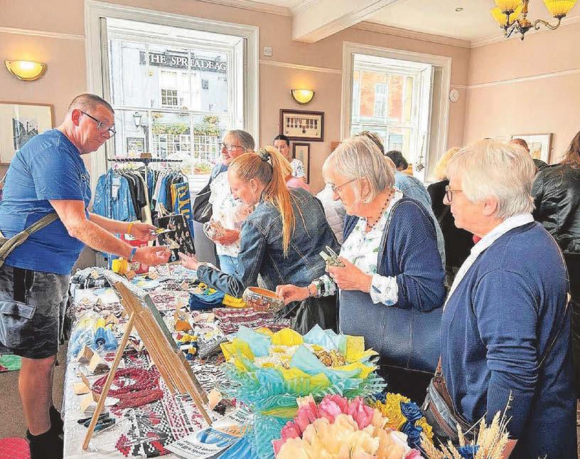 Hundreds gather at town hall in show of solidarity for Ukraine