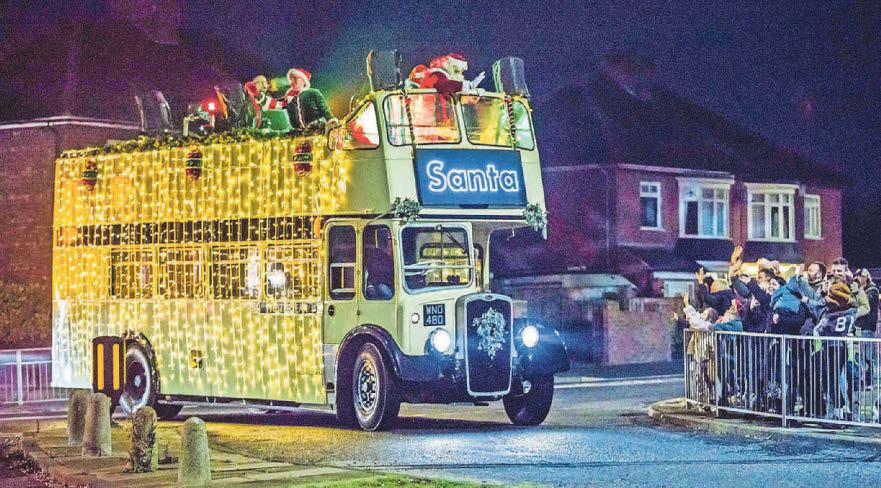 Family fun as Santa wheels into town