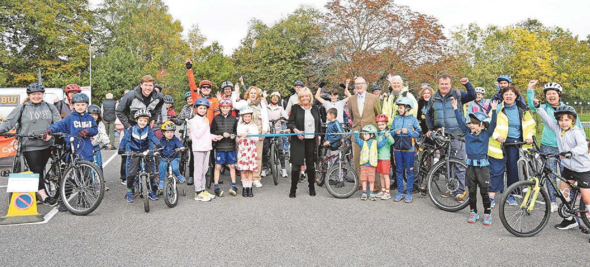 Dozens turn up for opening of east-west cycle route