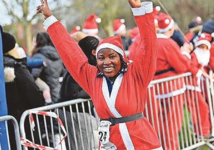 900 santas flood Priory Park to support crucial charity work