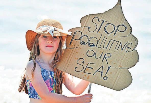 SEWAGE PROTESTERS FLOCK TO BEACHES