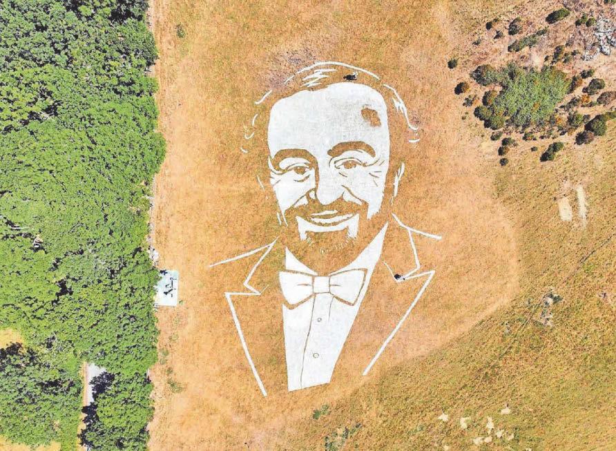 HUGE PAVAROTTI MURAL ON HILL