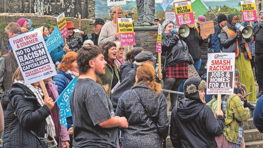 PROTESTERS STAND AGAINST RACISM
